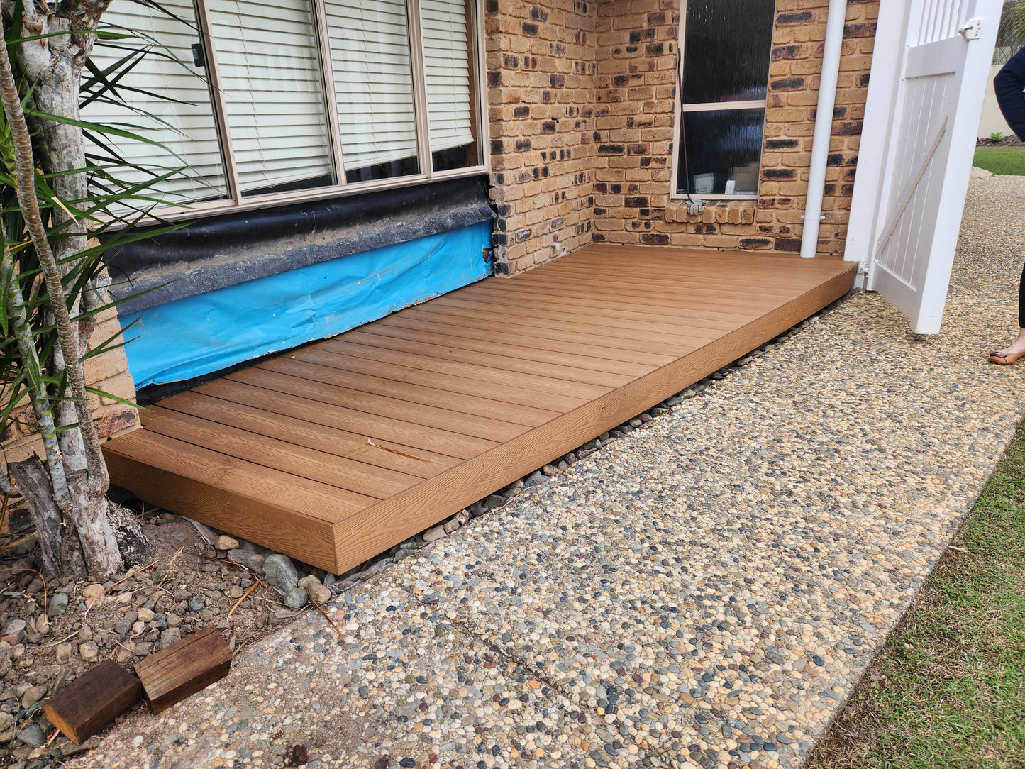 Outdoor deck made from composite materials, featuring a stylish and durable design