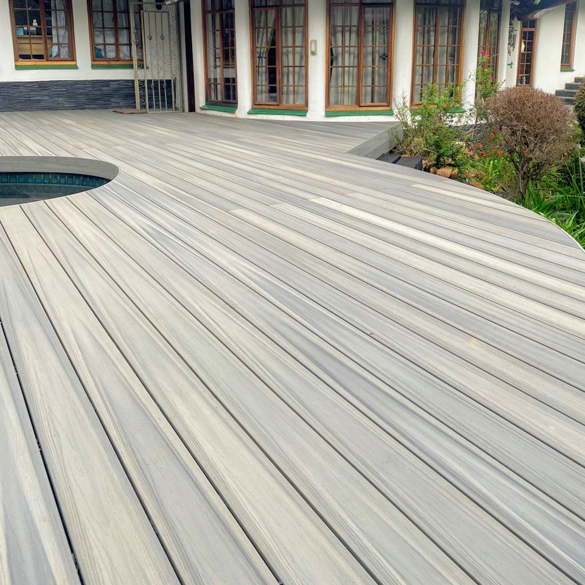 Close-up of composite decking with fascia board, highlighting clean and professional installation
