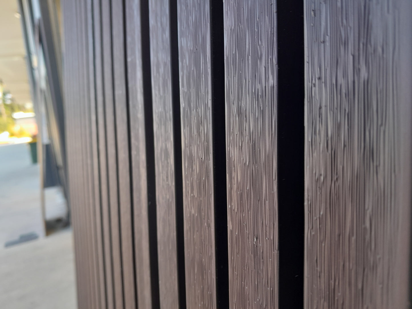 Close-up of WPC cladding with a smooth, modern finish for outdoor spaces.