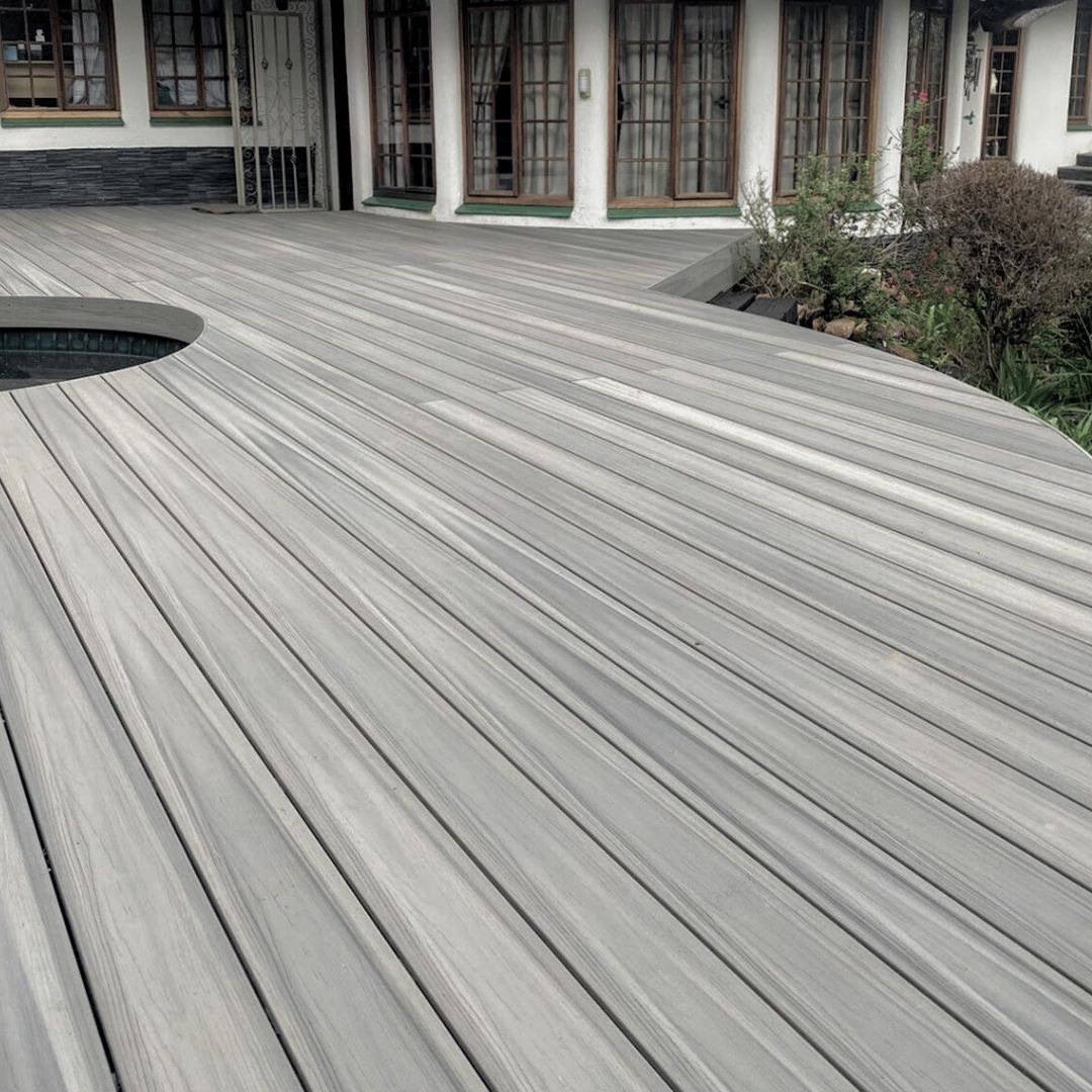Eco-friendly composite decking with a natural timber appearance, ideal for patios and gardens