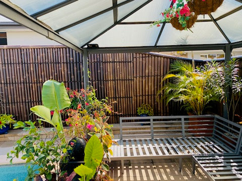 a privacy screen being used to create a nice little oasis 