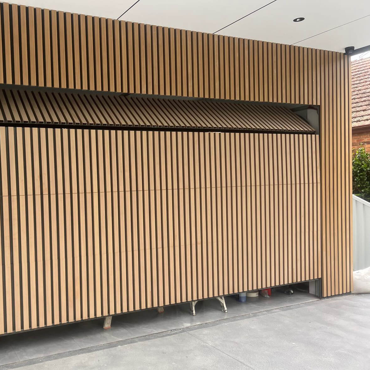an example of how the Cladding can be used for a garage door. wpc cladding in use.
