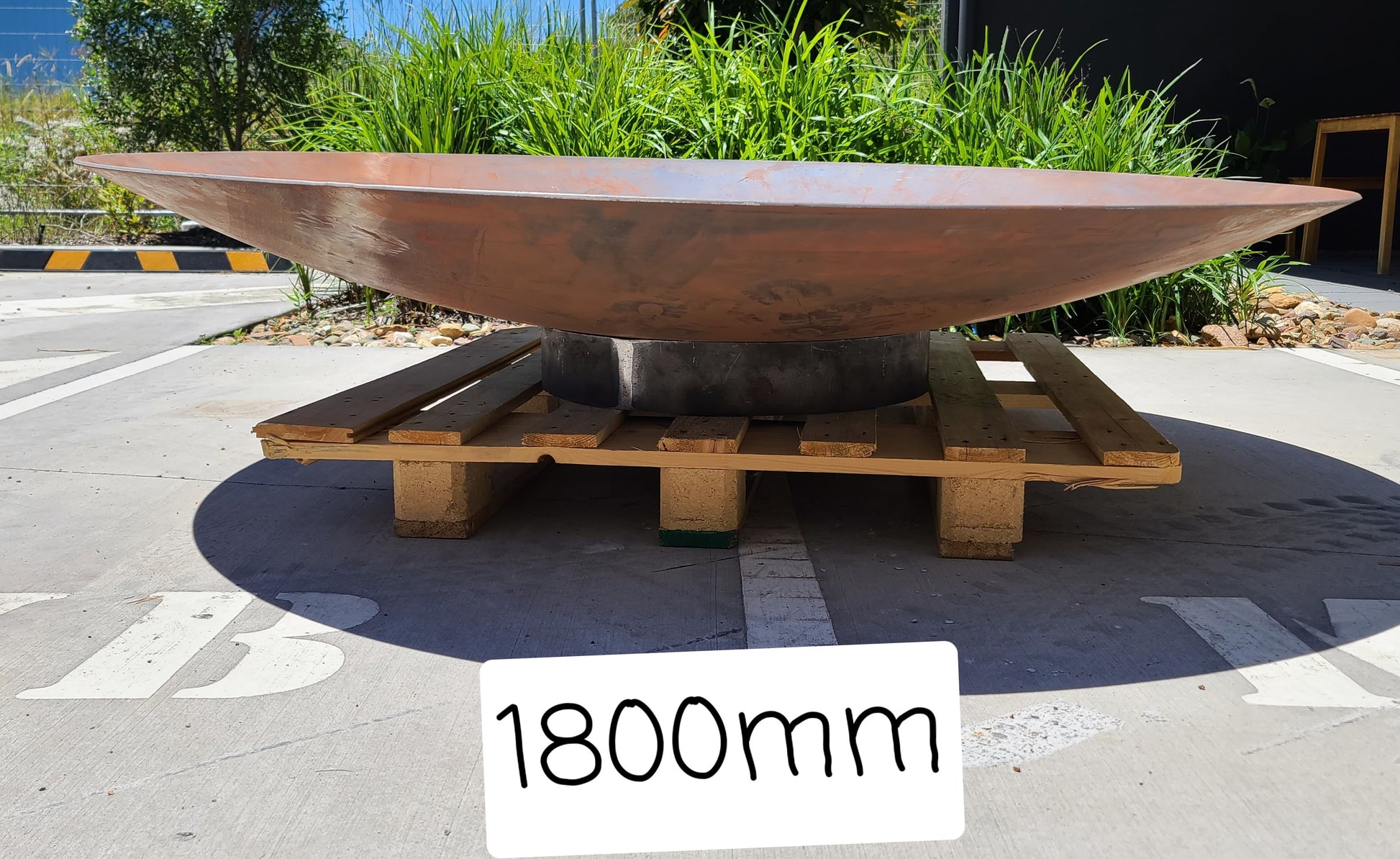 a massive 1800mm wide firepit thats is Corten steel and over 4mm thick!